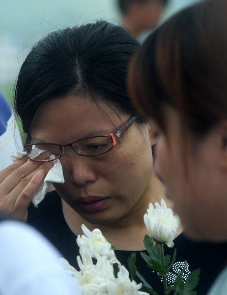 Family members mourn train crash victims