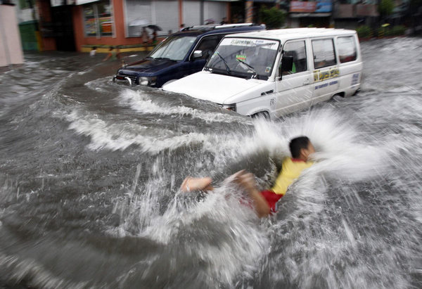 Floods due to Typhoon swamp Manila