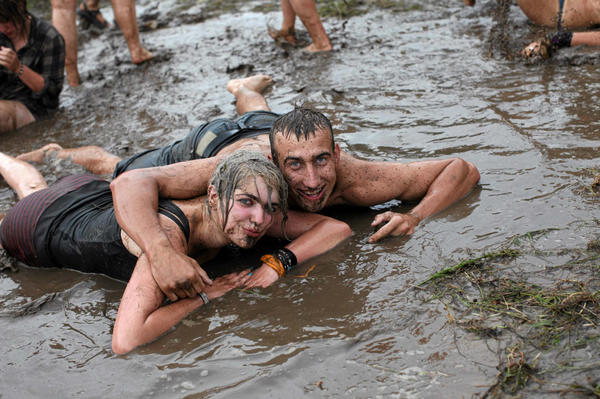 Revellers play in mud at Woodstock Festival