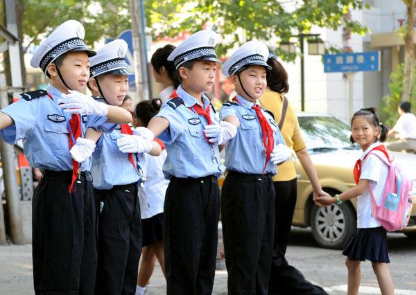 Children take charge of the road