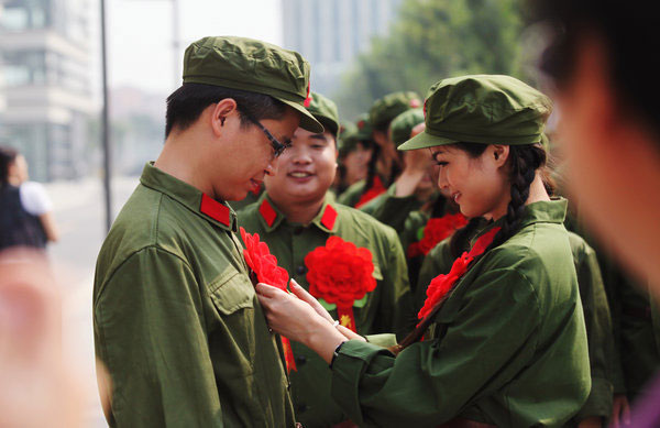 Couples marry in Red Army uniforms