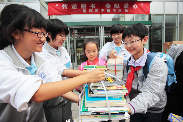 Beijing students donate 200,000 books to Shanxi
