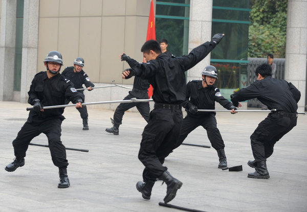Beijing bailiffs show off new defense skills
