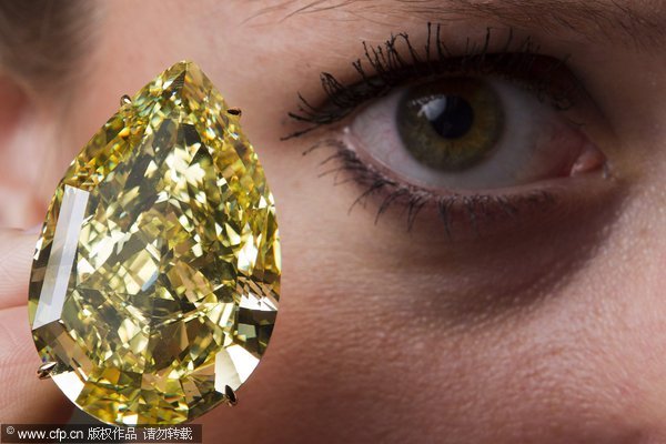 Large yellow diamond auctioned at record price