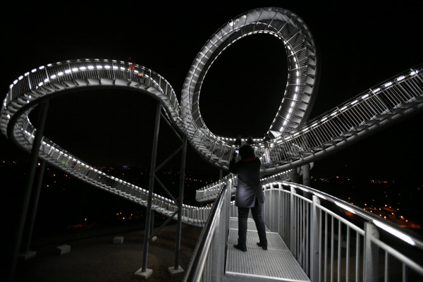 Walk on magical curved steel sculpture