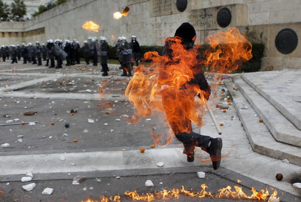 Greek police fire tear gas at protesters in Athens