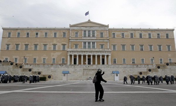 Greek police fire tear gas at protesters in Athens