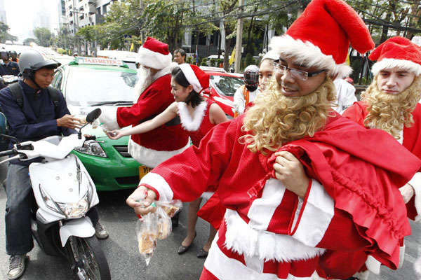 'Santa Claus' sends gifts in downtown Bangkok