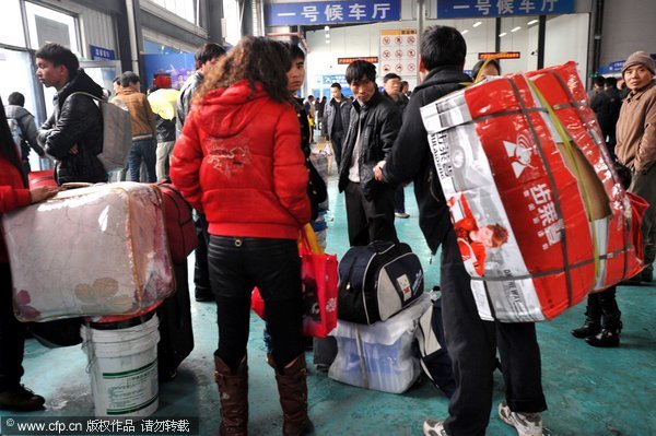 Heavy burden of getting home for Spring Festival