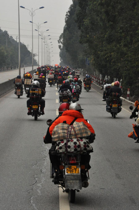 Annual mass motorbike migration revs home