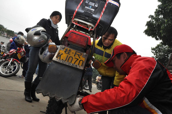 Annual mass motorbike migration revs home