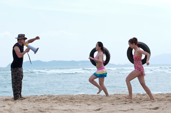 Bodyguard candidates toughen up on the beach