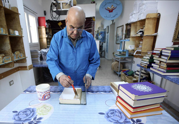 Restoration works on copy of the Koran