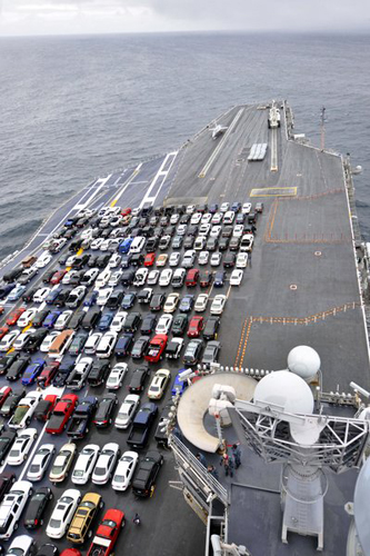 Carrier transports Sailors' vehicles