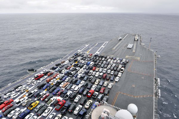 Carrier transports Sailors' vehicles