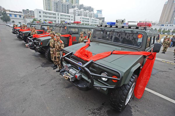 Armed police roll out new China-made trucks