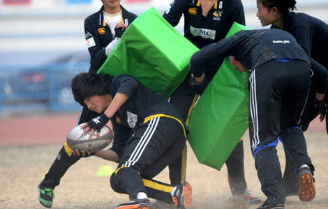 Female rugby team trains for '14 Youth Olympics