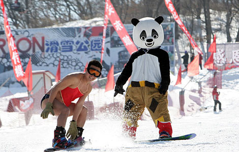 Underwear skiers enjoy fun and games in snow