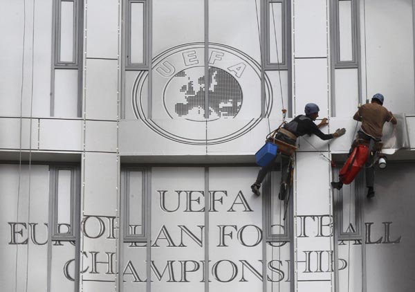 Building decorated with huge Euro 2012 trophy