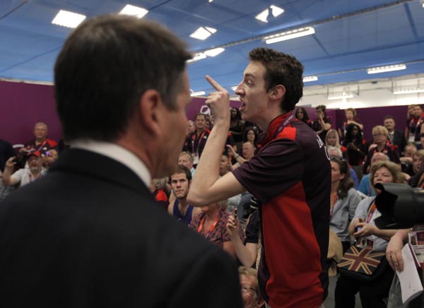 Cameron heckled by a volunteer
