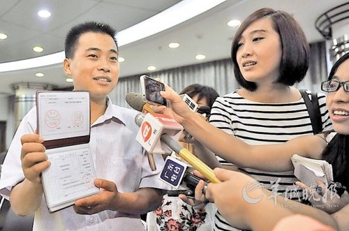 Balcony hero settles in Guangzhou