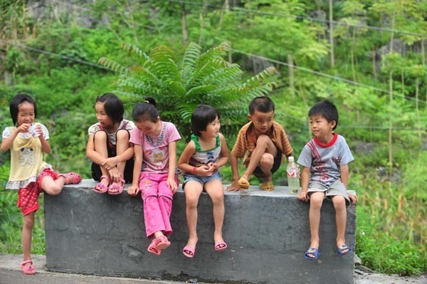 Left behind, children turn to nature