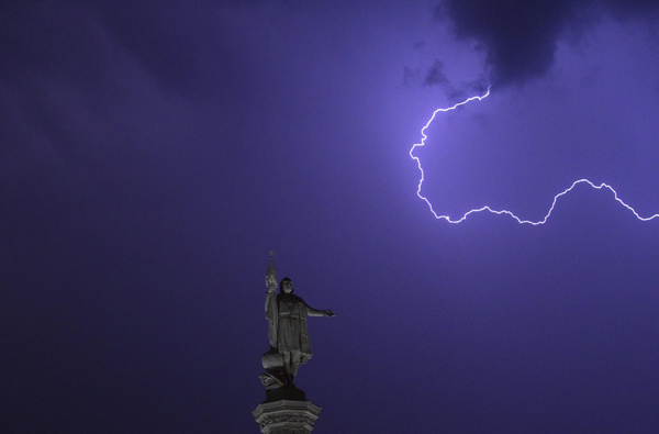 Lightning illuminates Madrid's Colon Square
