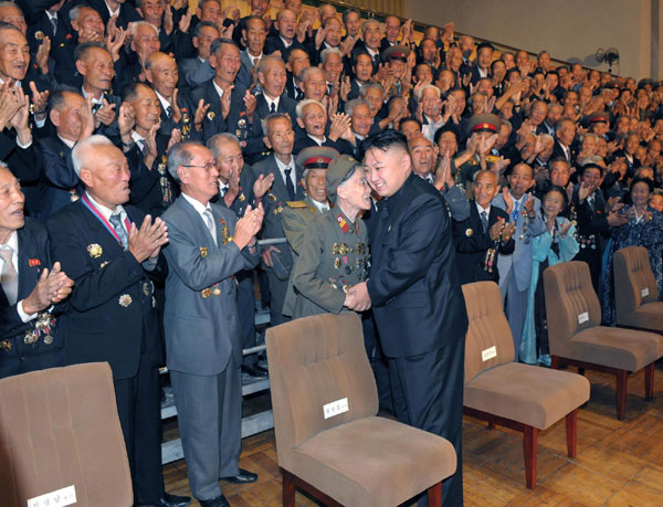 DPRK leader Kim Jong-un greets veterans