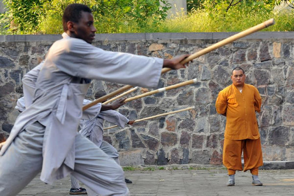 African apprentices practise kung fu at Shaolin Temple