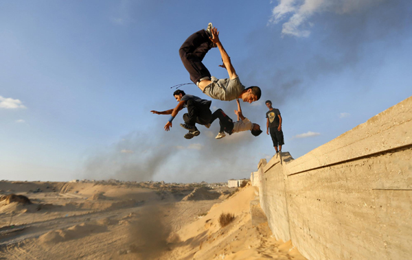 Palestinian youths show parkour skills