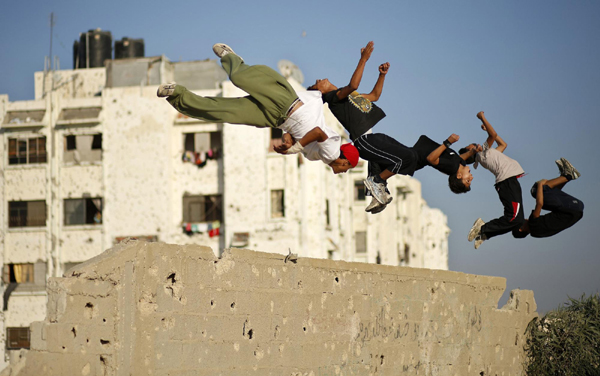 Palestinian youths show parkour skills