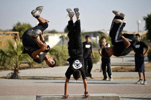 Palestinian youths show parkour skills