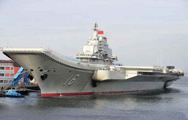 Hu attends aircraft carrier handover ceremony