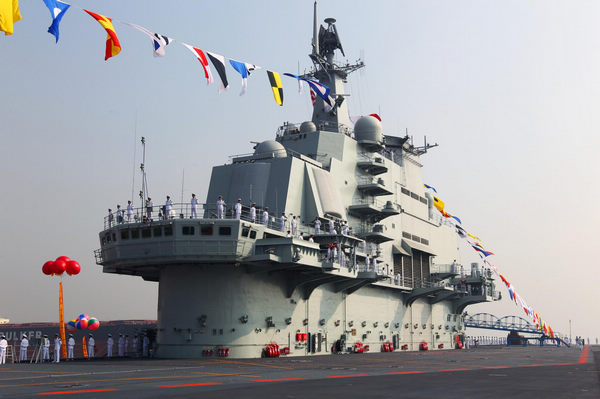 Hu attends aircraft carrier handover ceremony
