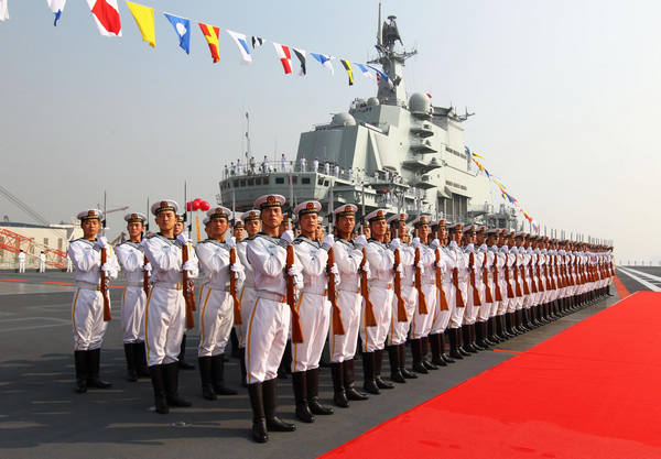 Hu attends aircraft carrier handover ceremony