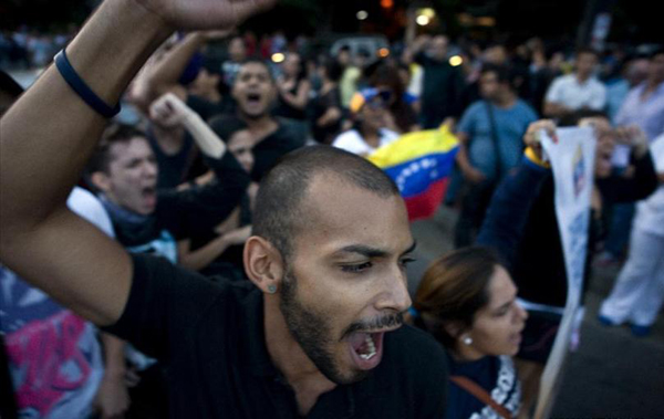 Capriles supporters protest against election results