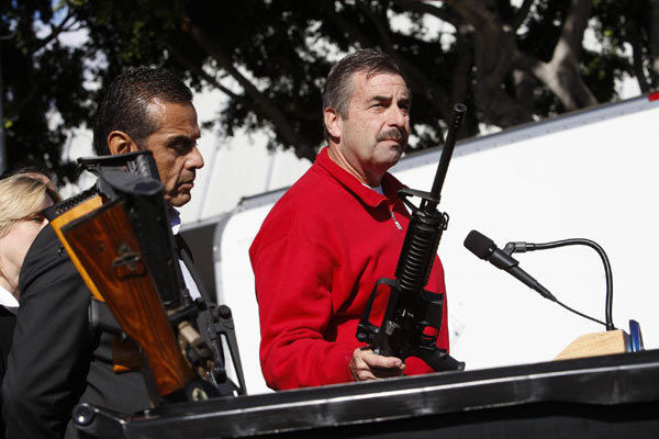 LA police buy back guns after school shooting