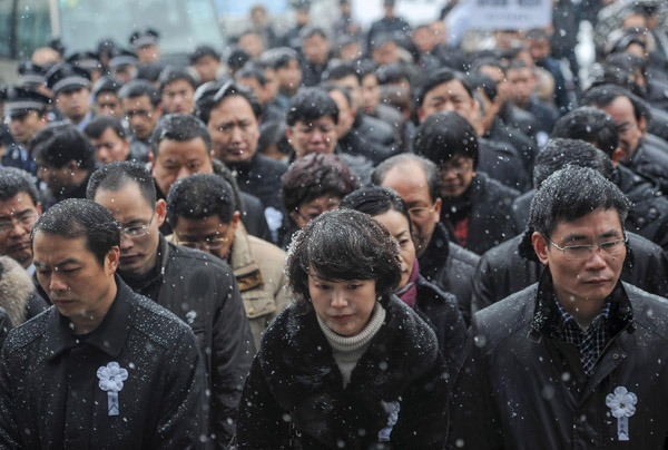 People gather to mourn fallen firefighters