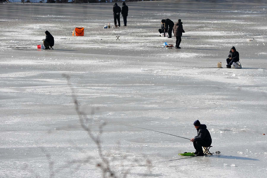 Ice fishing in E China