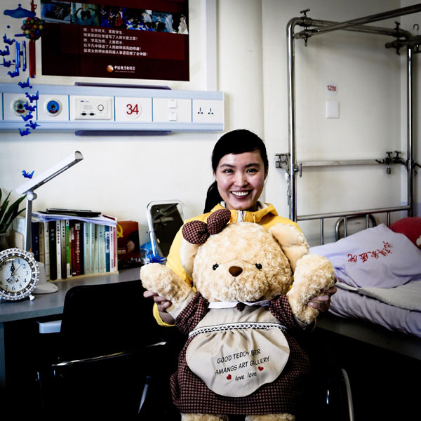 Zhang Lili, a 29-year-old teacher at the No 19 Middle School in the city of Jiamusi in Northeast China's Heilongjiang province. Good Samaritans of 2012
