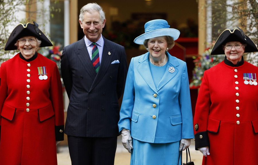 Britain's Prince Charles (2nd L) and former Prime Minister Margaret Thatcher (2nd R) pose with Chelsea pensioners Dorothy Hughes (L) and Winifred Phillips as they attend the opening of a new infirmary at the Royal Hospital Chelsea in London in this March 25, 2009 file photo. Margaret Thatcher with politicians