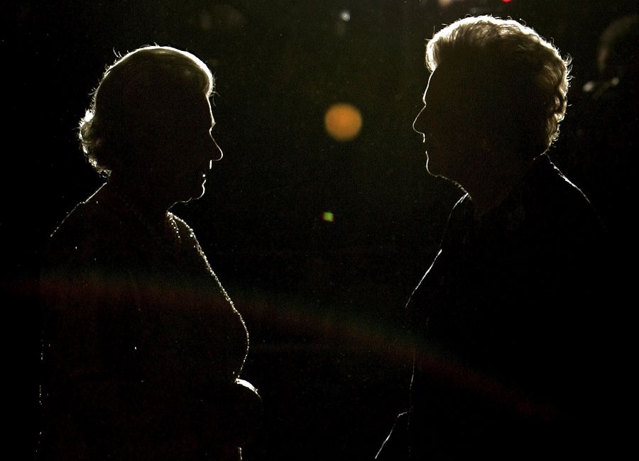 Britain's Queen Elizabeth (L) is greeted by former Prime Minister Margaret Thatcher as she arrives at Thatcher's 80th birthday celebrations at the Mandarin hotel in London in this October 13, 2005 file photo. Margaret Thatcher with politicians