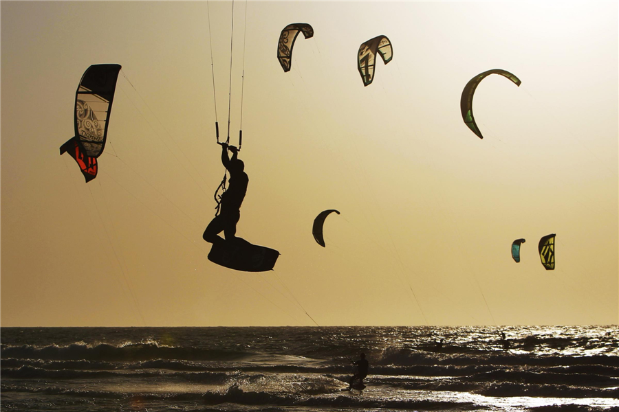 Kite surfers in Mediterranean sea