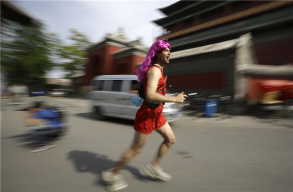 Red Dress Run charity event held on Mother's Day