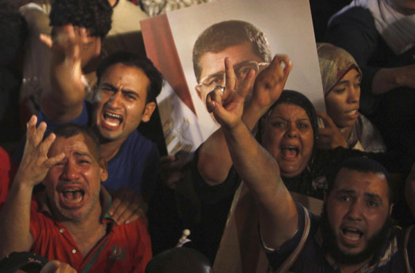 Jubilant crowds celebrate after Morsi overthrown