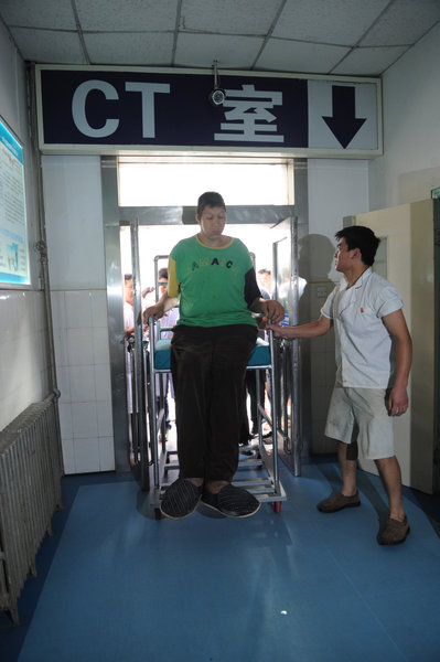 Asia's tallest man hospitalized