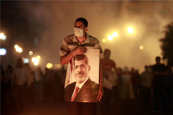 Pro-Morsi protesters, police face off in Cairo