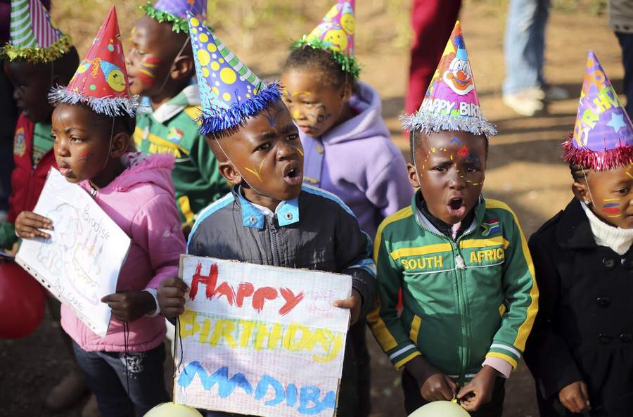 'Improving' Mandela marks 95th birthday