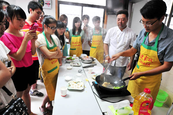 College students train to be domestic helpers