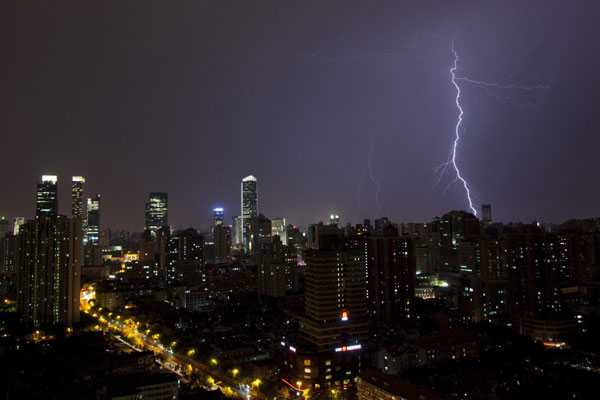 Lightning illuminates the cities